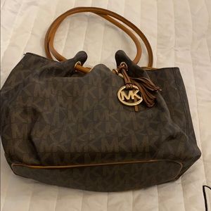 Michael Kors and matching wallet.